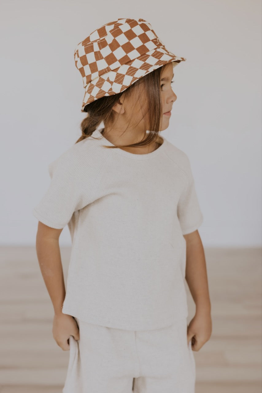 a girl wearing a hat