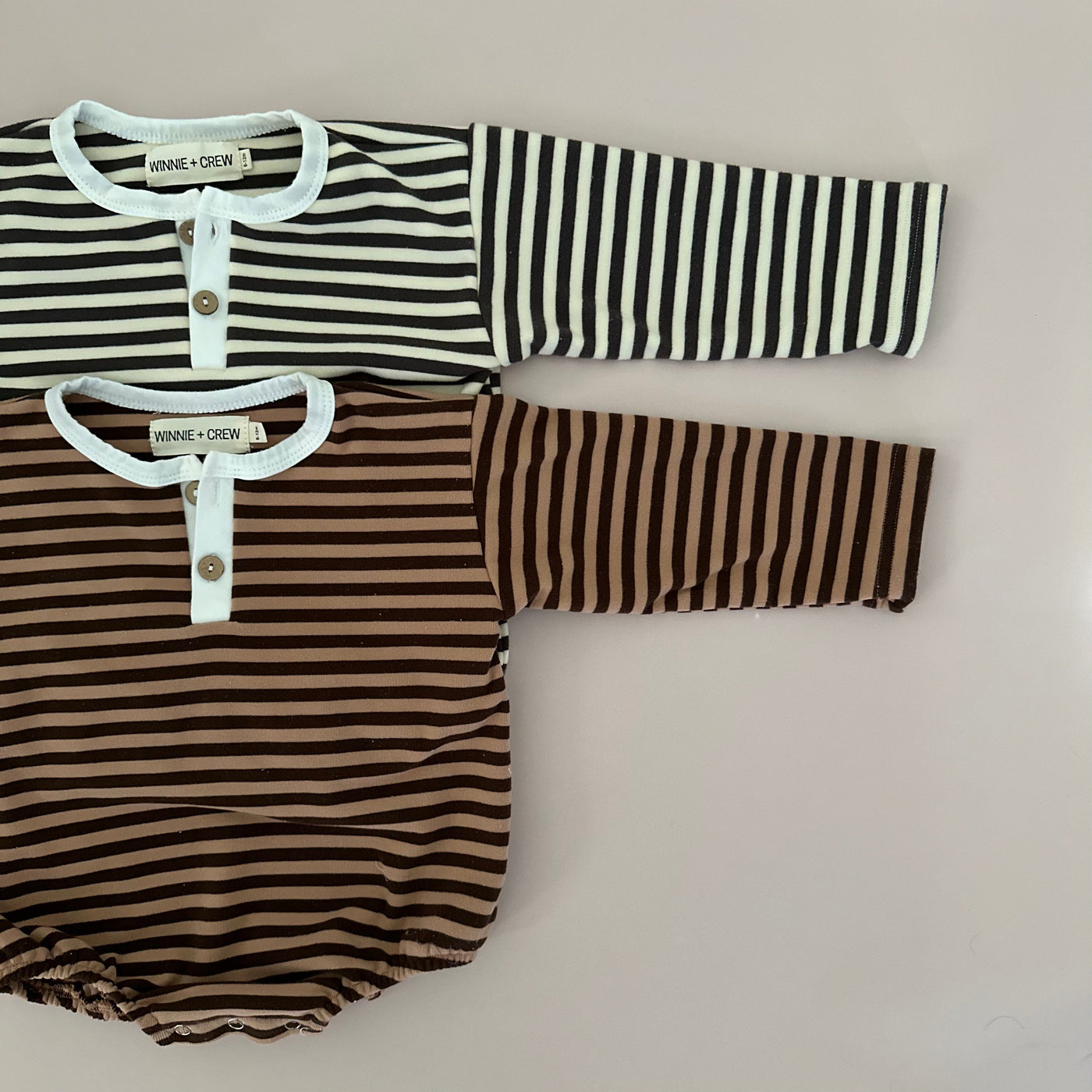 a pair of baby clothes
