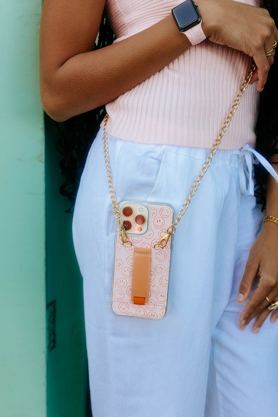a woman wearing a phone case
