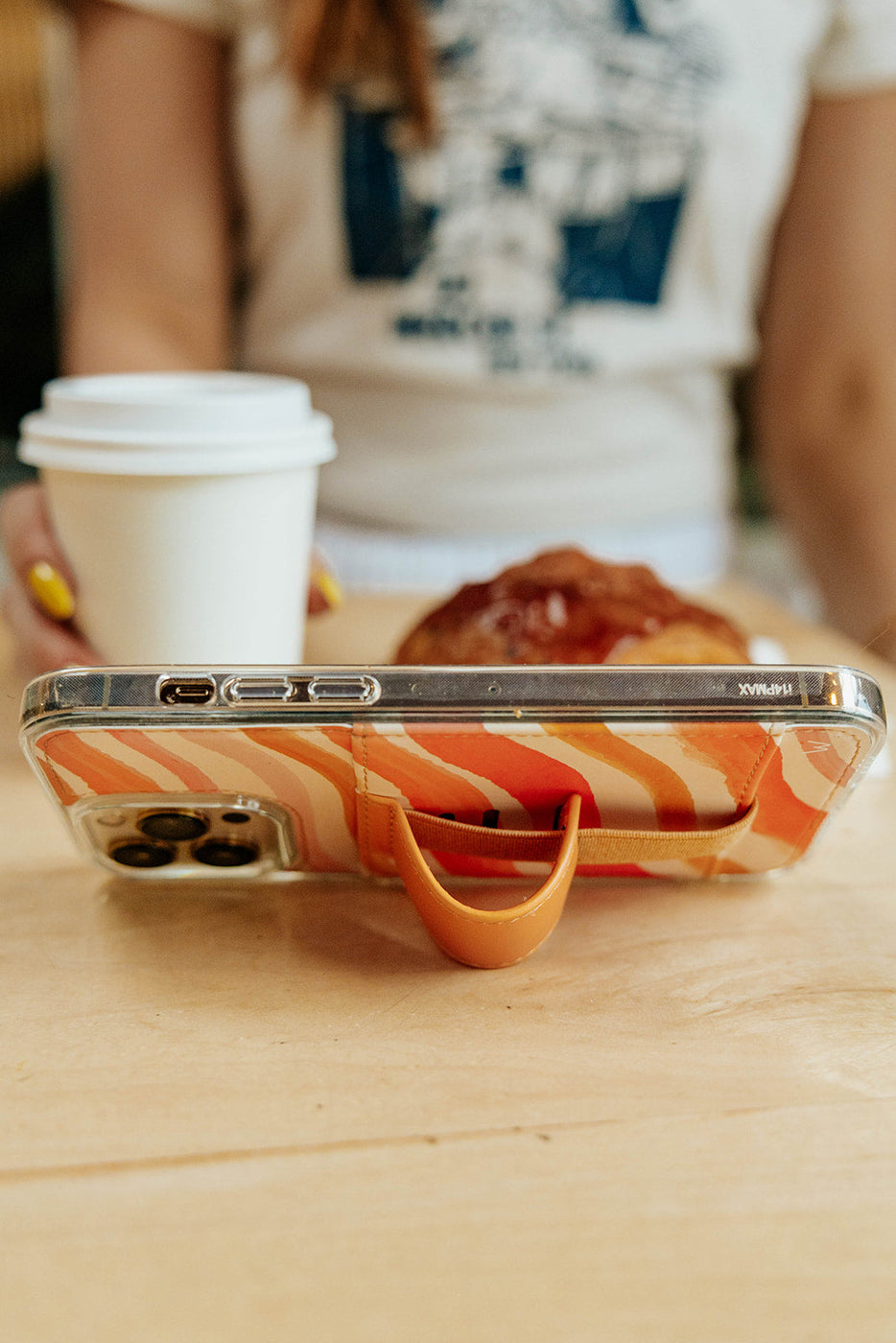 a phone case and a cup of coffee