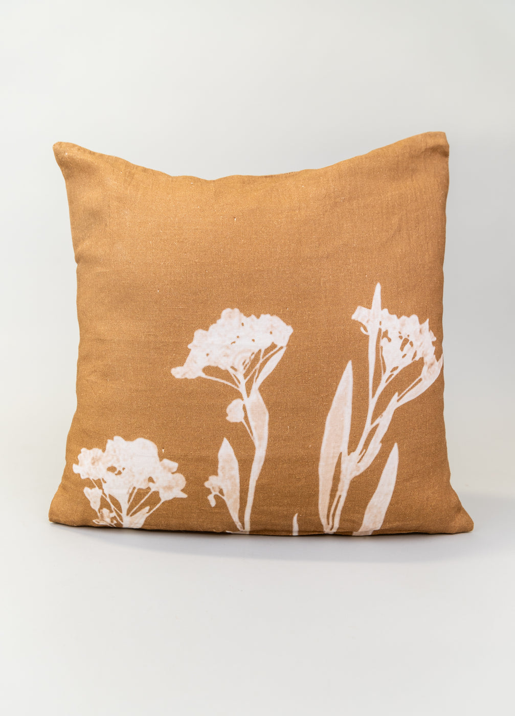 a pillow with a flower design
