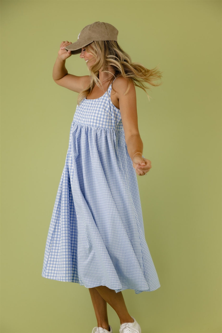 a woman in a blue and white dress