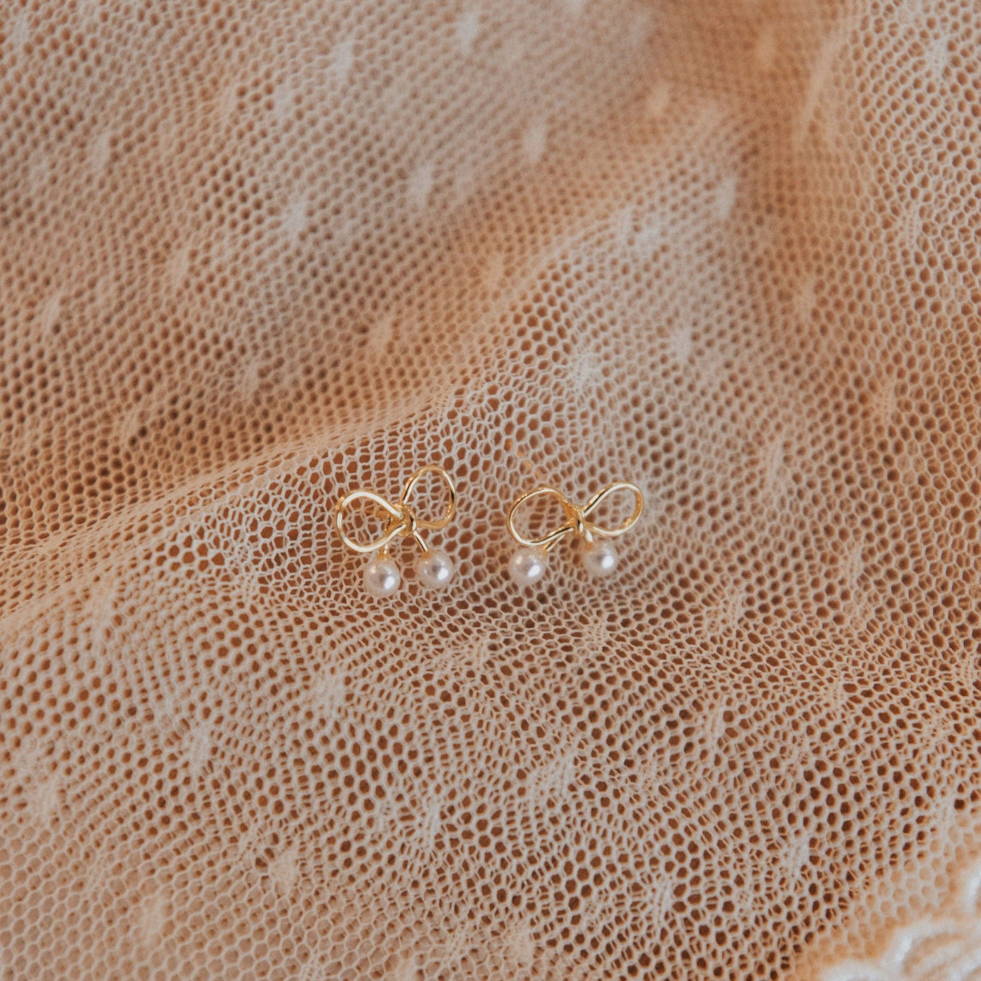Mila Pearl and Gold Bow Studs