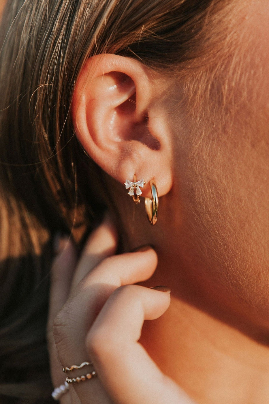 a close up of a woman's ear