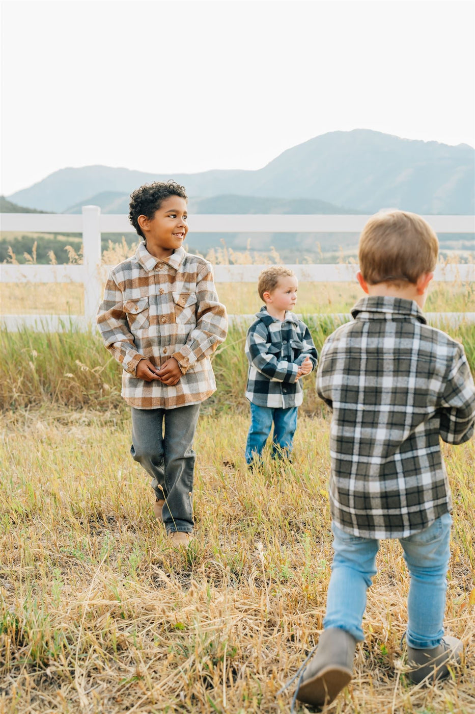 a group of children in a field