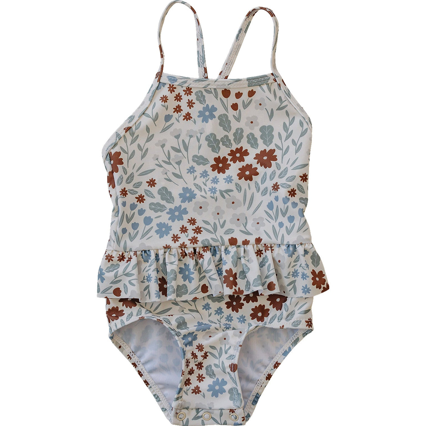 a white and blue swimsuit with a floral pattern