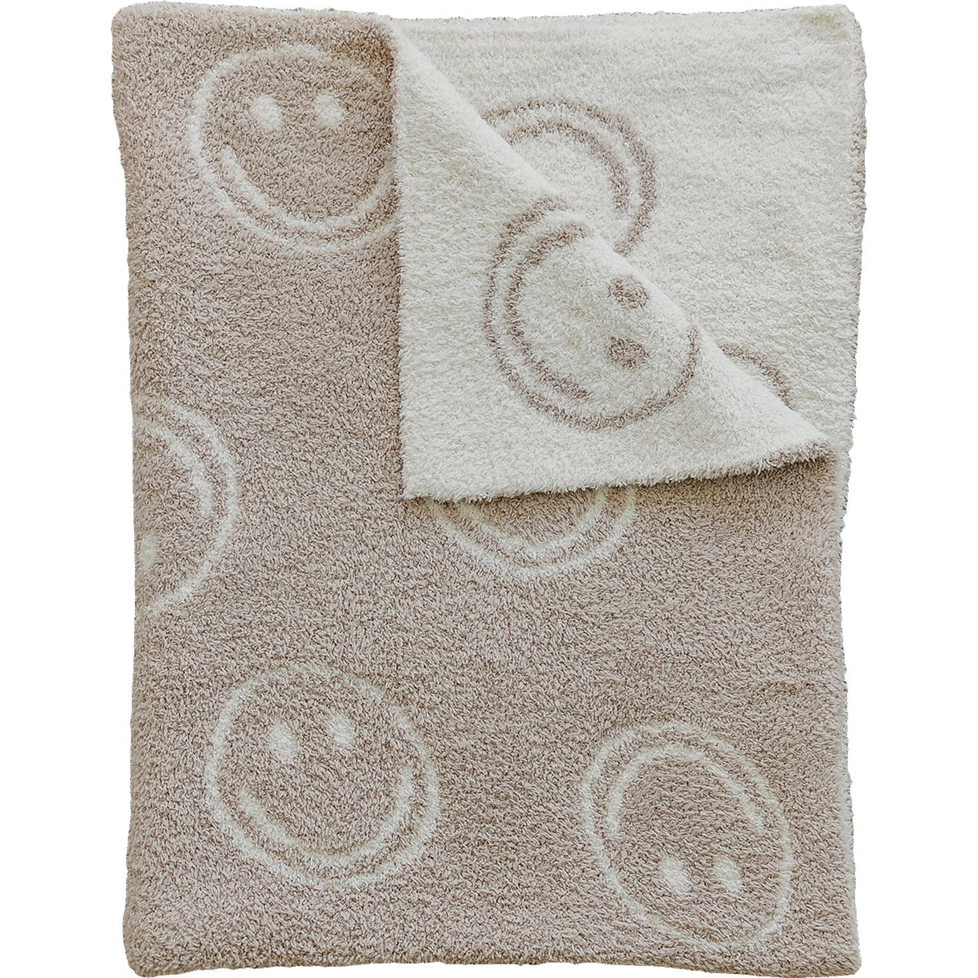 a blanket with a smiley face design