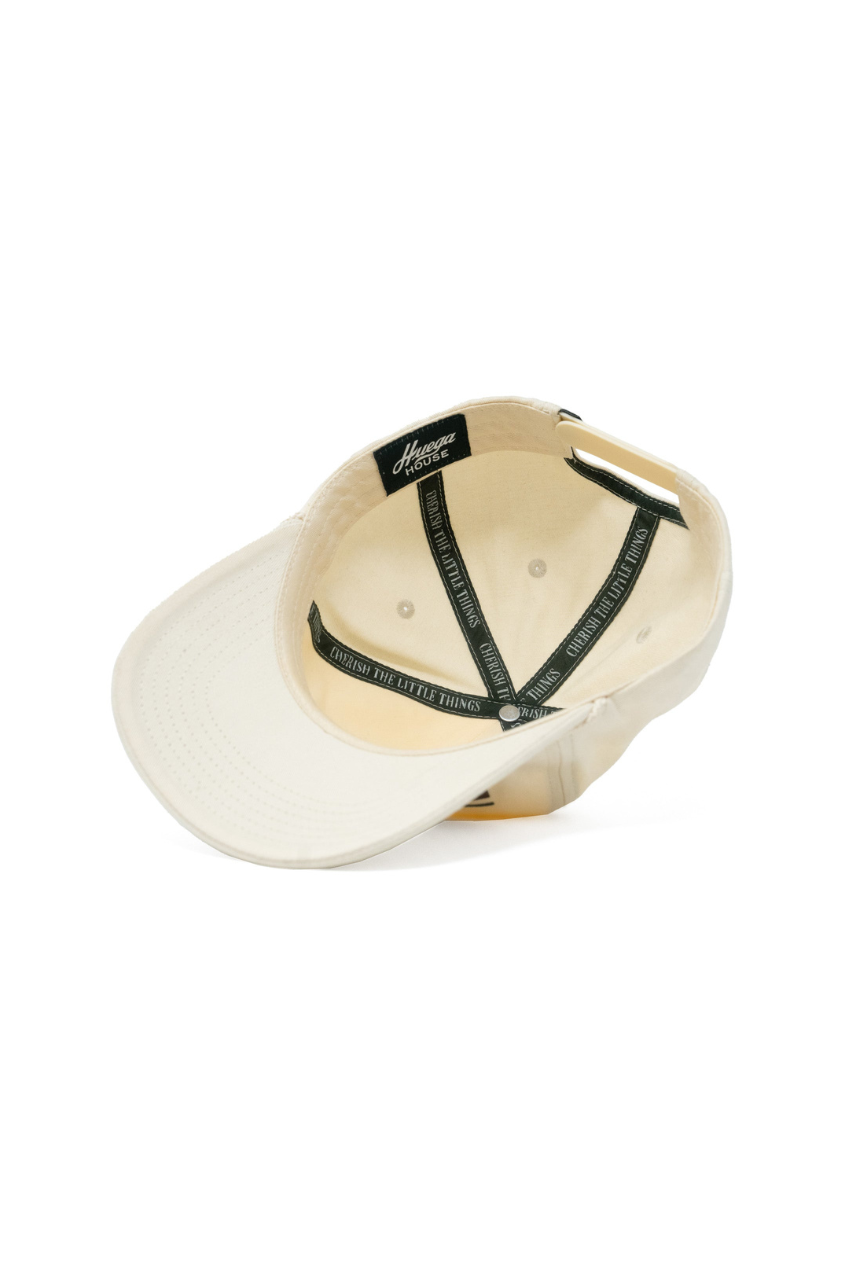 a white hat with black straps