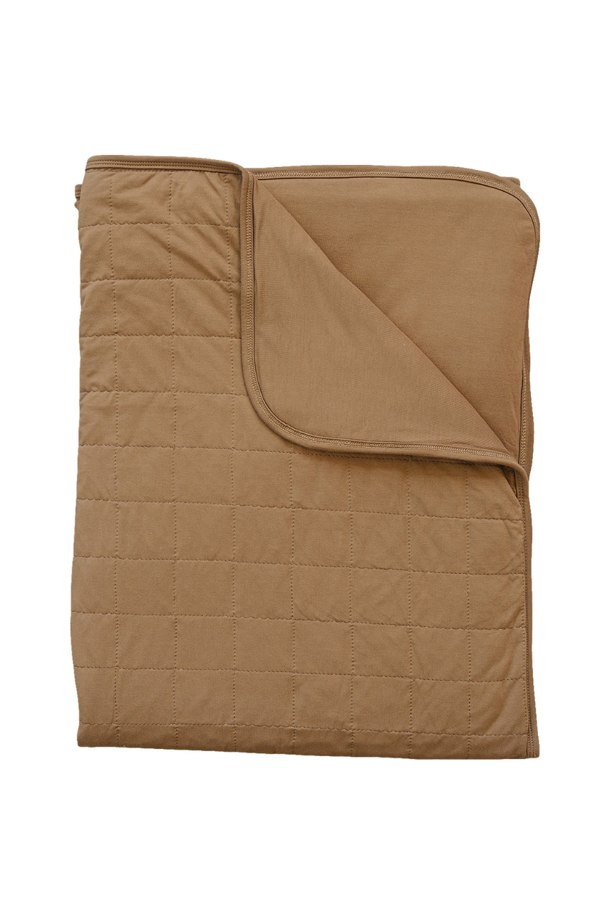 a brown blanket with a folded edge