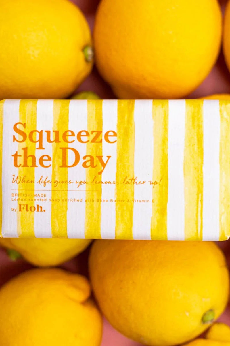 Bar of soap with 'Squeeze the Day' text surrounded by lemons