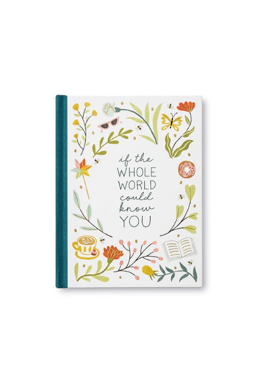 a white notebook with flowers and leaves