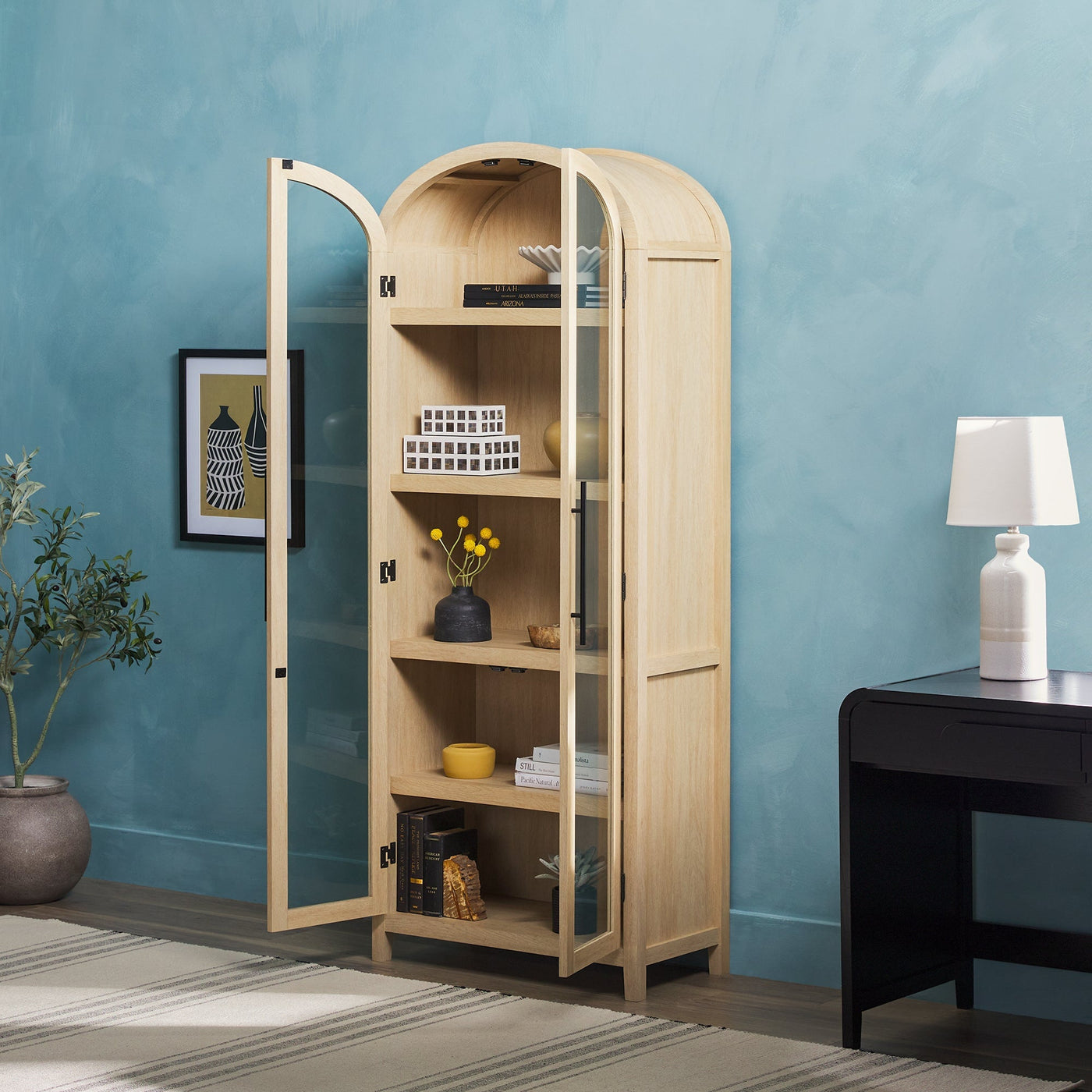 a cabinet with a glass door