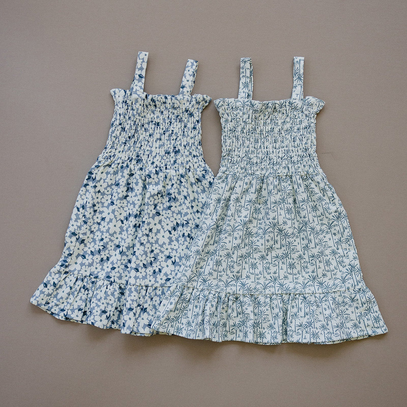 two dresses on a surface