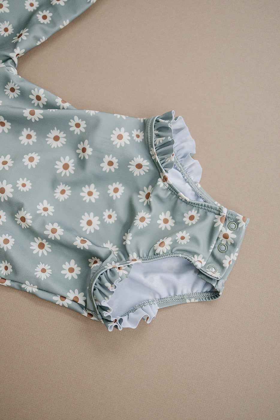 a baby girl's one piece swimsuit