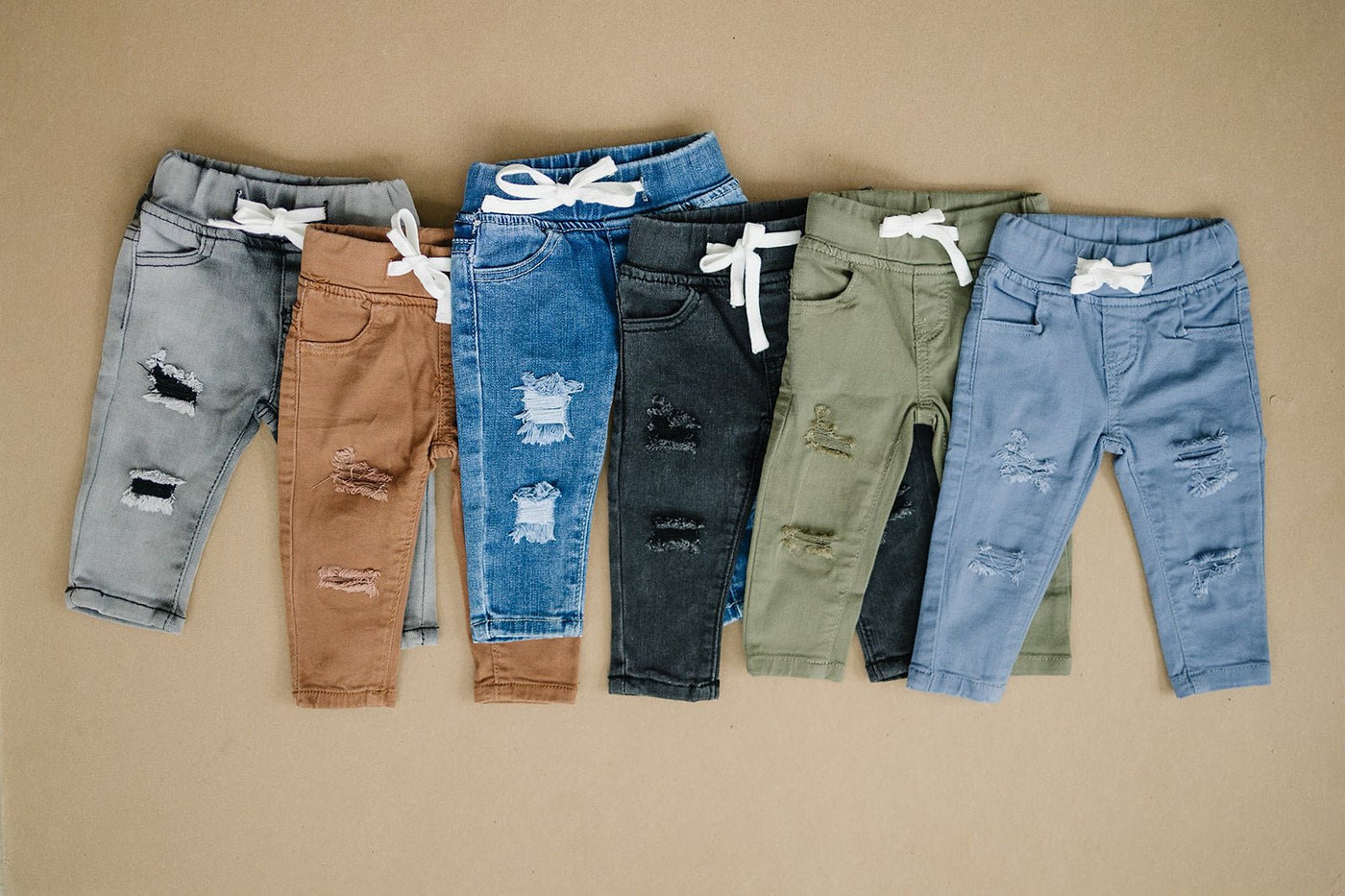 a group of different colored pants