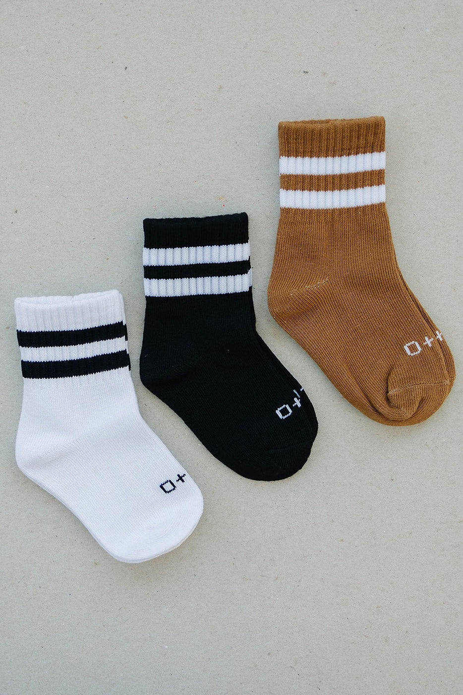 a group of socks on a white surface