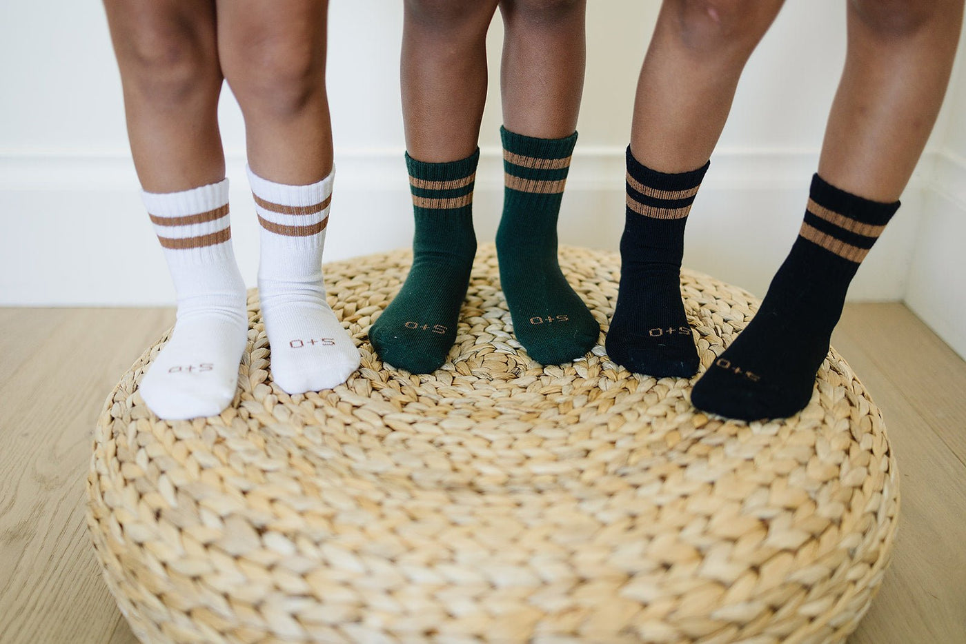 a group of children's feet in socks