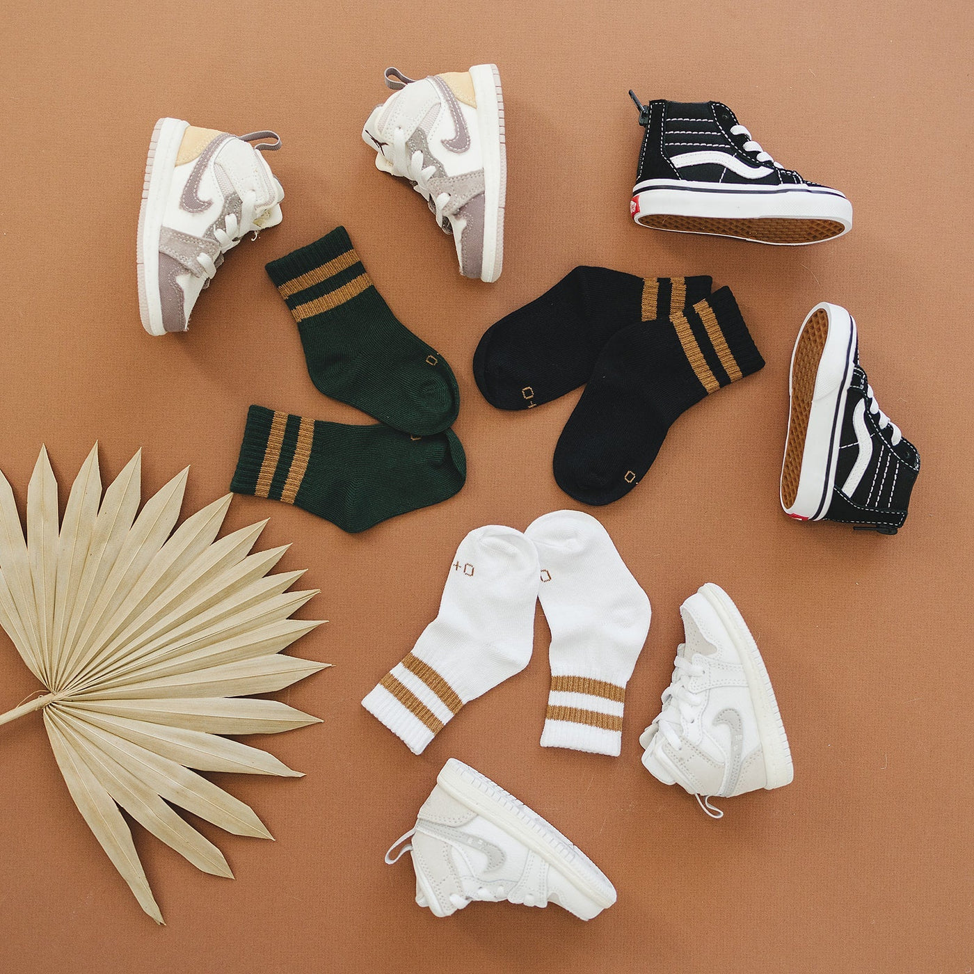 a group of baby shoes and socks