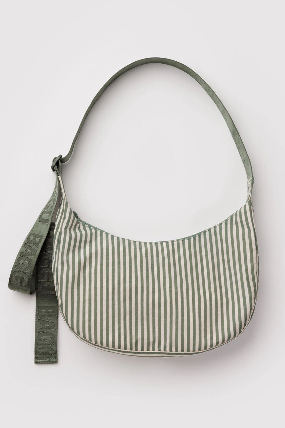 Green and white striped shoulder bag on a light gray background