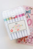 Set of double-ended art markers in a clear plastic case with a colorful label on a white background.