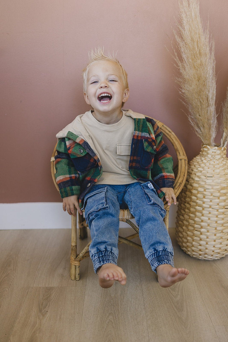 a boy sitting in a chair