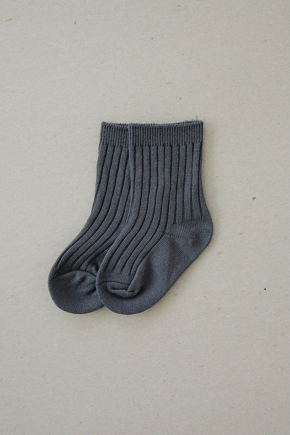 a pair of grey socks