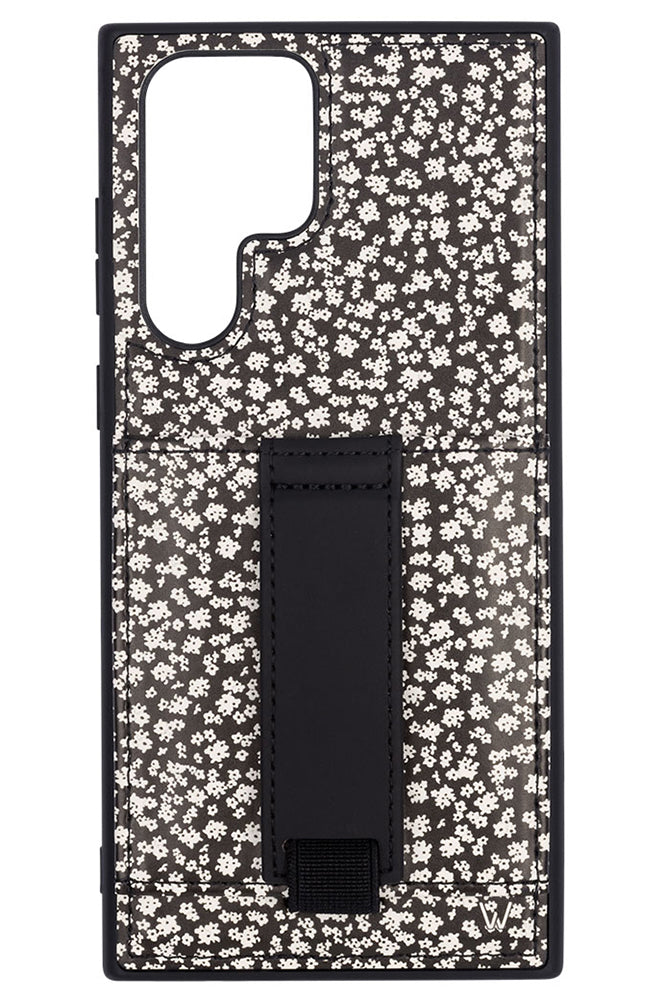 a phone case with a black and white floral design