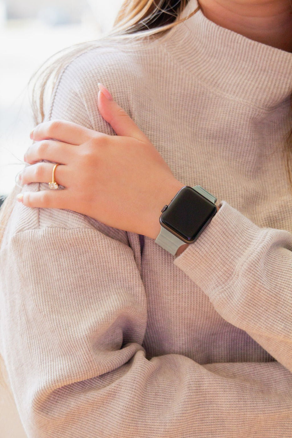 a woman wearing a watch