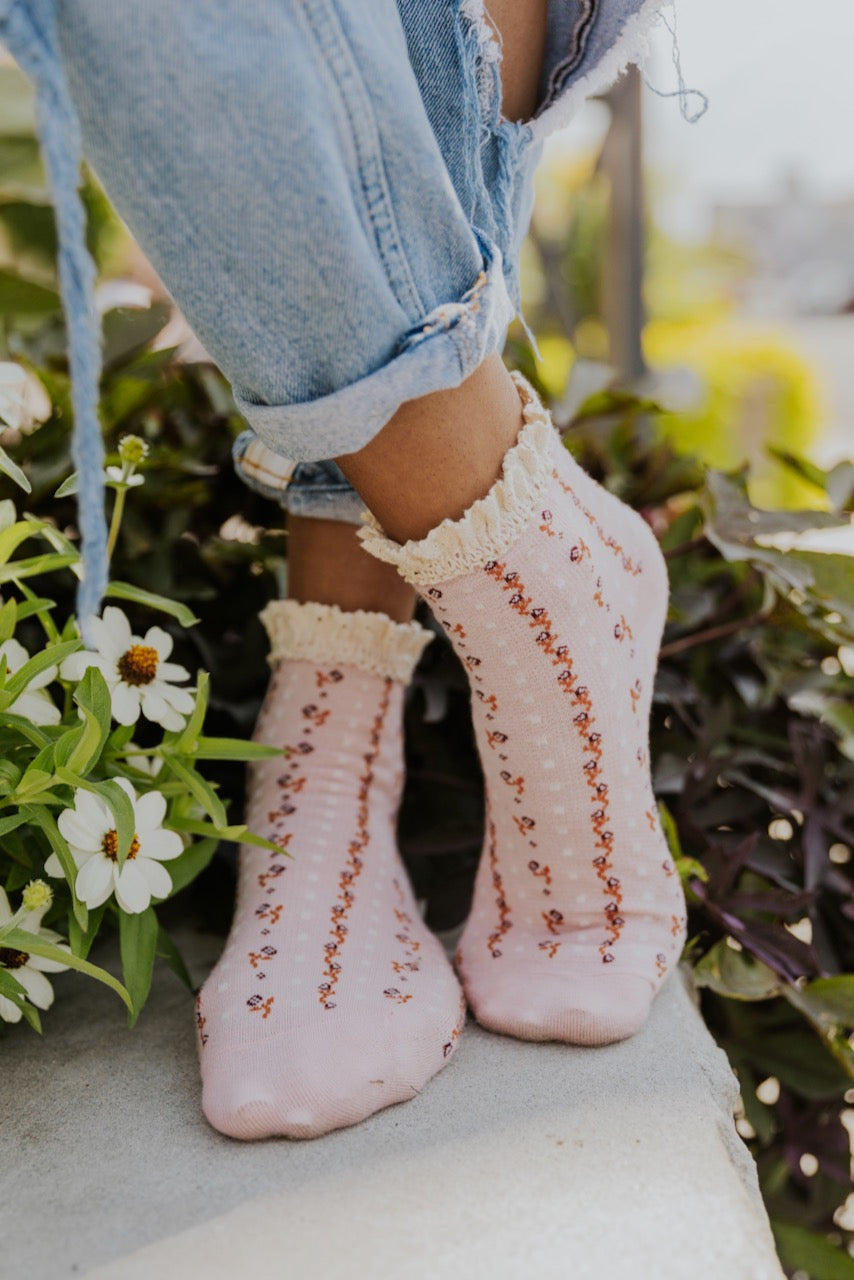 a person's feet wearing socks