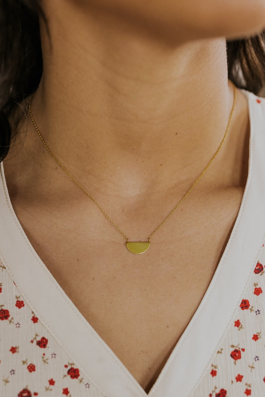 a person wearing a necklace