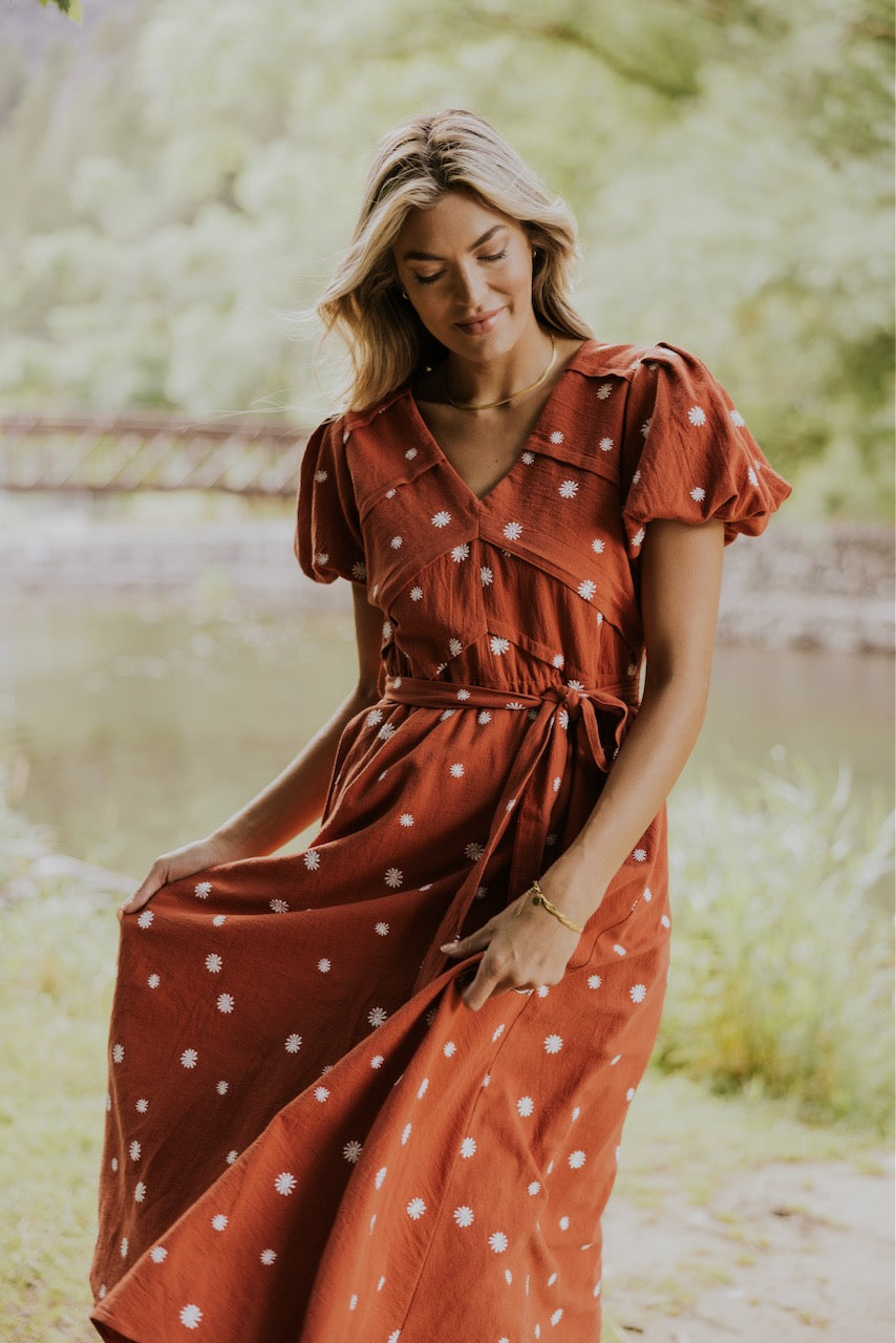 a woman in a red dress