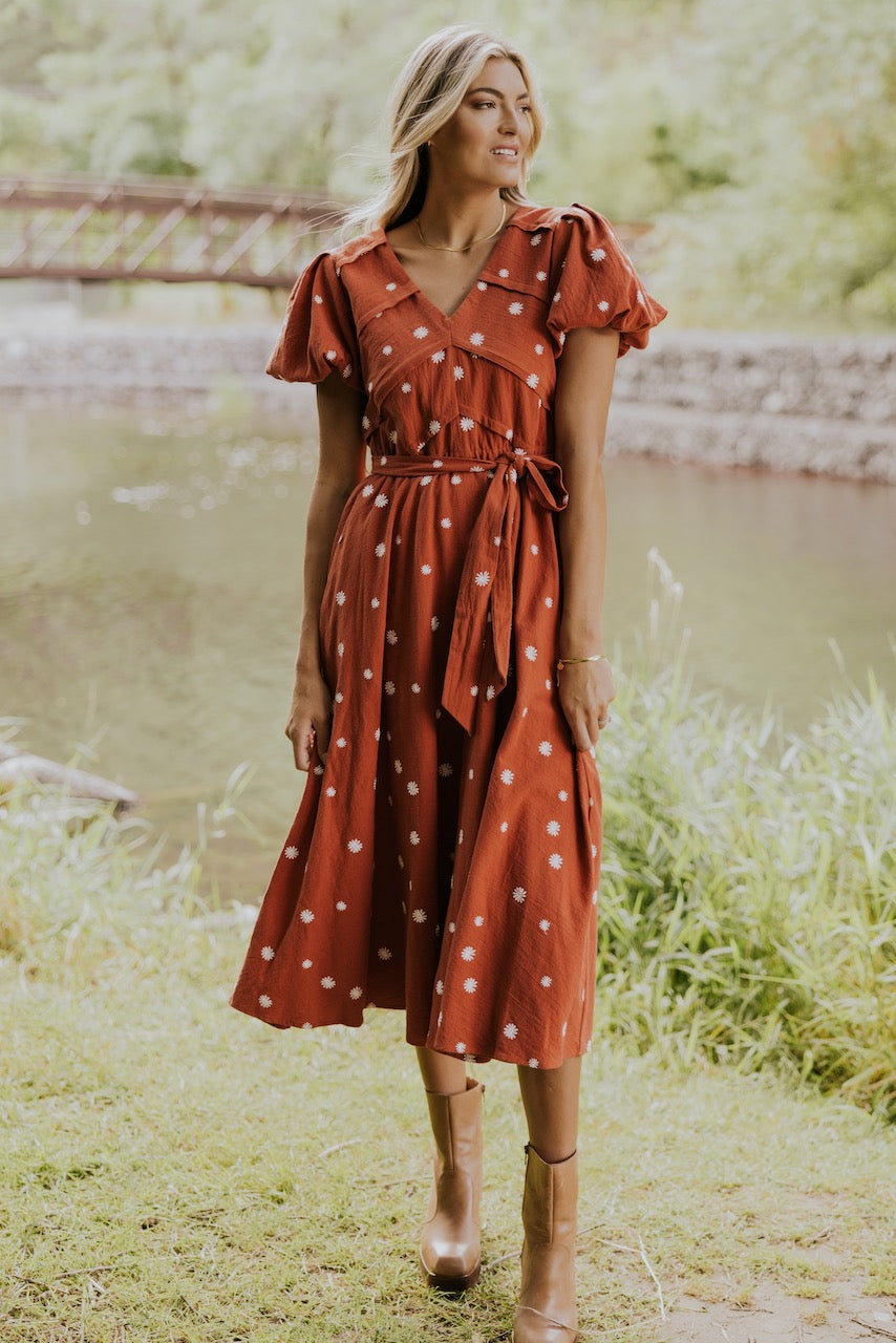 a woman in a red dress