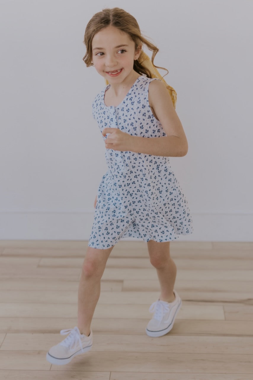 a girl in a dress running